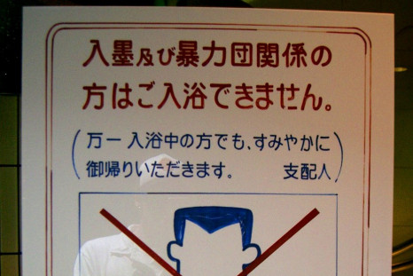 Sign banning yakuza members entering a business in Sento, Japan