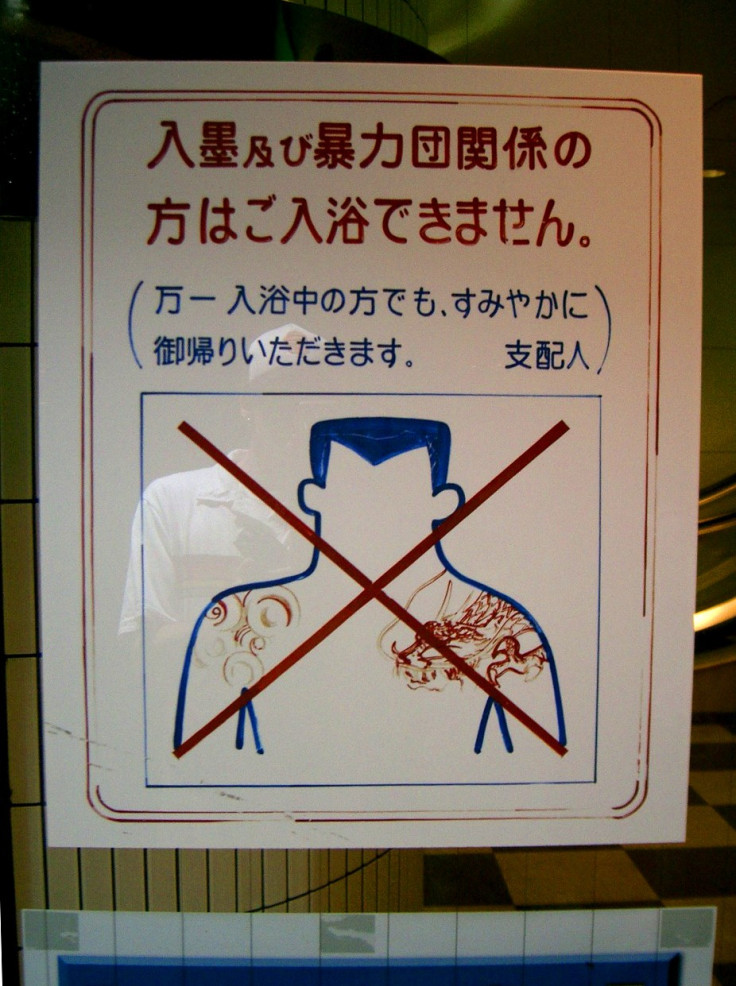 Sign banning yakuza members entering a business in Sento, Japan