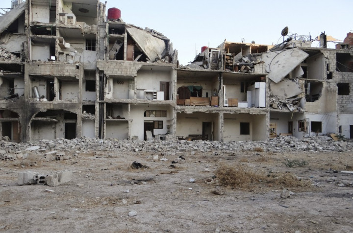 Buildings damaged by shells in Damascus Buildings damaged by shells in Damascus
