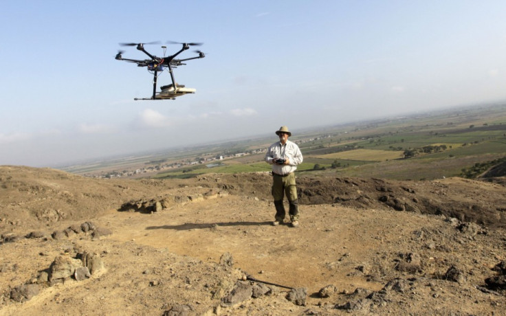 Luis Jaime Castillo, a Peruvian archaeologist with Lima's Catholic University and incoming deputy culture minister, flies a drone over the archaeological site of Cerro Chepen in Trujillo August 3, 2013. (Reuters)