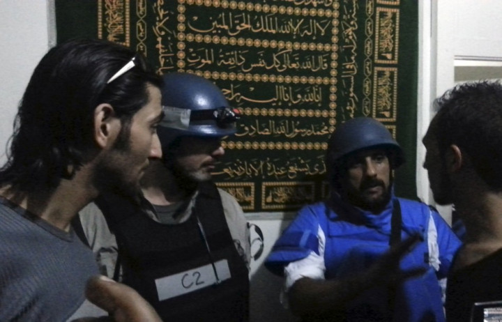 U.N. chemical weapons experts meet residents at one of the sites of an alleged poison gas attack in the southwestern Damascus suburb of Mouadamiya U.N. chemical weapons experts meet residents at one of the sites of an alleged poison gas attack in the southwestern Damascus suburb of Mouadamiya