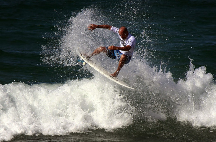 Eleven-time world surfing champion Kelly Slater of the USA rides a wave during a promotional event at Sydney's Manly Beach. (Reuters)