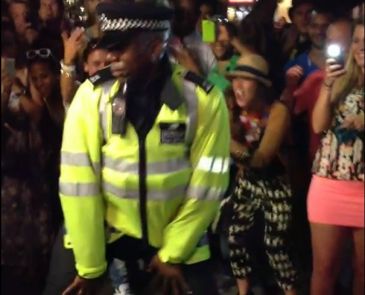 Police officer twerks at Notting Hill Carnival 2013 in London PIC: YouTube MOOFBulleh