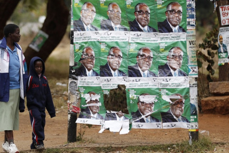 Images of Zimbabwe president Robert Mugabe still litter towns after last month's election PIC: Reuters