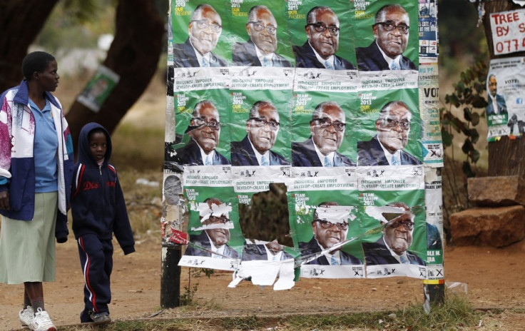 Images of Zimbabwe president Robert Mugabe still litter towns after last month's election PIC: Reuters