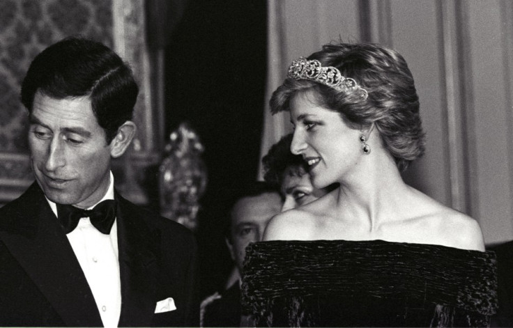 This photo perhaps shows the love Diana had for Prince Charles, for she ardently looks at him at a Banquet held at the Ajuda palace in Lisbon February 12, 1986. (REUTERS)