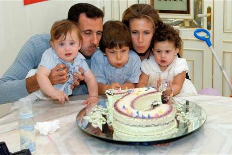 Syrian president with wife and three children