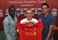 Liverpool defenders Sakho (left) and Ilori (right) with managing director Ian Ayre (centre). (Photo: Liverpool FC)