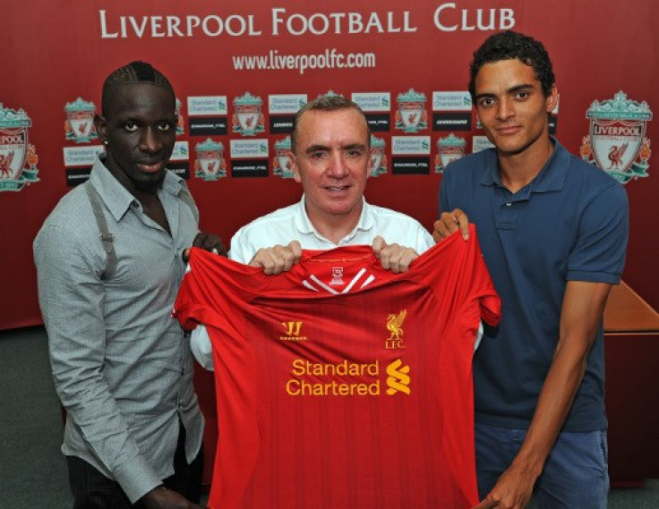 Liverpool defenders Sakho (left) and Ilori (right) with managing director Ian Ayre (centre). (Photo: Liverpool FC)