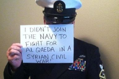 Navy marine's slogan reads 'I didn't join the Navy to fight for Al Qadea in a Syrian civil war PIC: Twitter