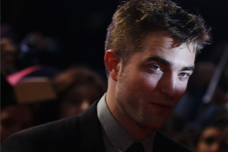 Robert Pattinson Sizzles in New Dior Homme Advert With Camille Rowe/Reuters