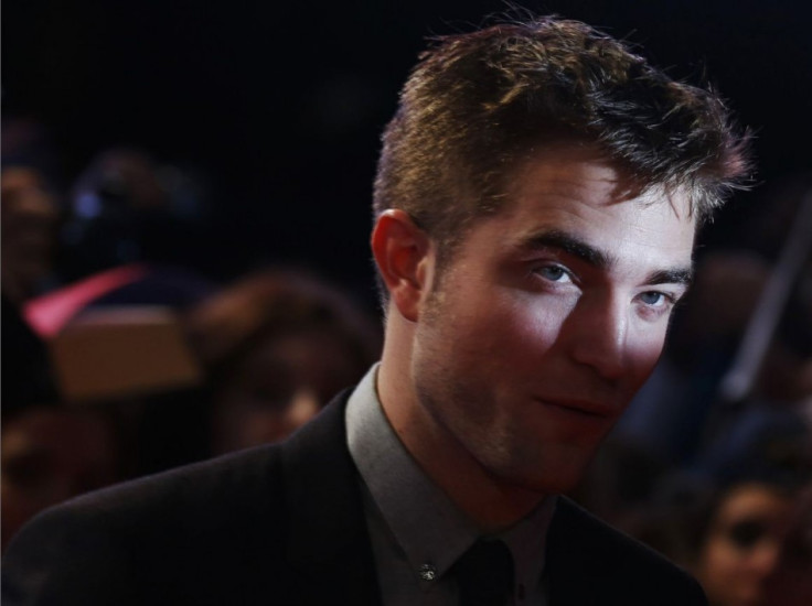 Robert Pattinson Sizzles in New Dior Homme Advert With Camille Rowe/Reuters