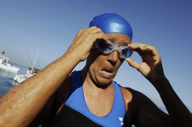 Swimmer Diana Nyad adjusts her goggles before attempting to swim to Florida from Havana (Reuters)