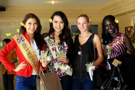 (L to R) Contestants from Singapore, Indonesia, Bulgaria and South Sudan pose at Nirwana Bali Resort upon arriving in Indonesia. A record 131 contestants from different nationalities will compete for Miss World 2013 title to be held on 28 September in Jak