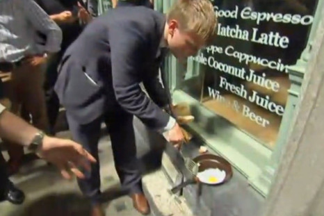 Egg sizzles on Eastcheap from Walkie Talkie tower block heat