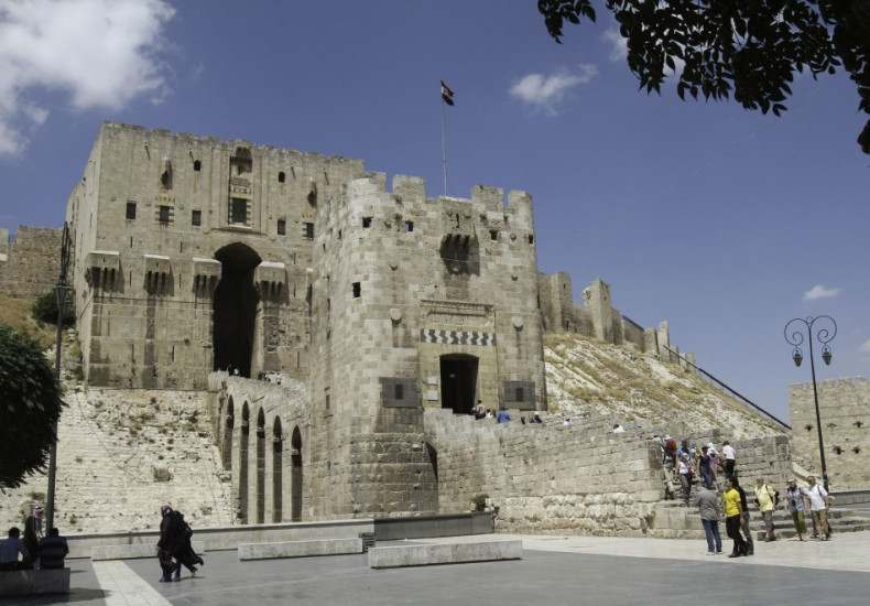 A man walks past the entrance of the Citadel of Aleppo in northern Syria on June 23, 2010, before the Syrian civil war began. (REUTERS/Khaled al-Hariri)