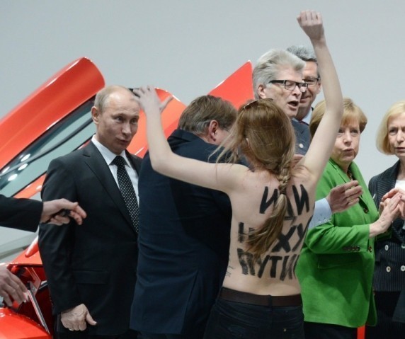 Femen protesting against Putin Femen protesting against Putin