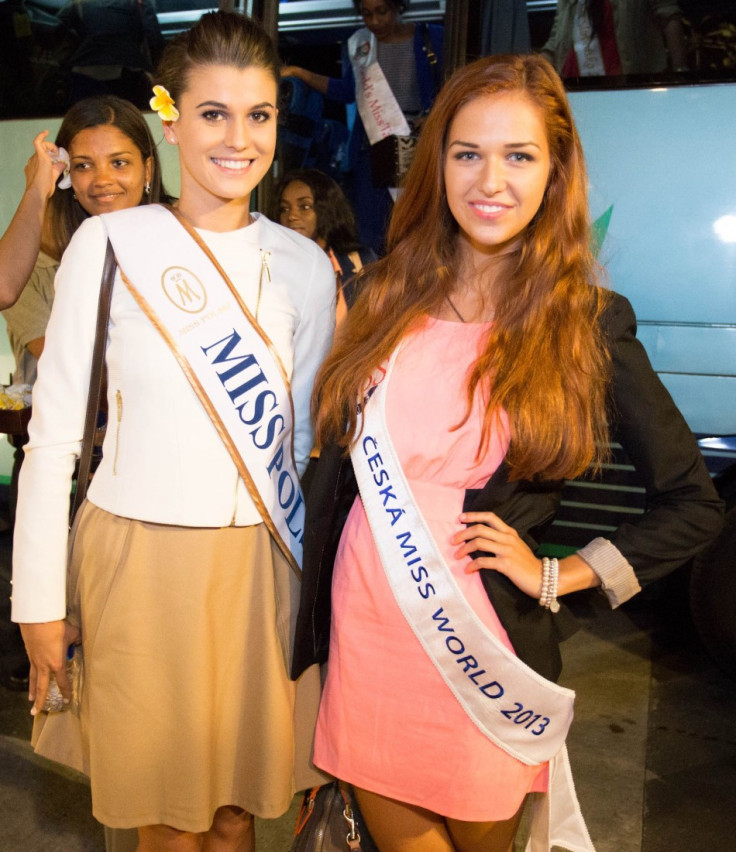 Miss Poland 2013, Katarzyna Krzeszowska, and Miss Ceska after receiving welcome flower in Bali, Indonesia, on 3 September, 2013. The month-long Miss World 2013 pageant has begun in Indonesia. (Photo: Miss World Indonesia 2013)
