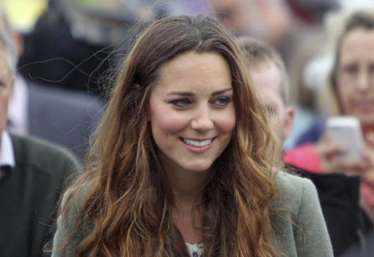Catherine, Duchess of Cambridge visits the Breakwater country park, to start the Ring O Fire ultra marathon, in Anglesey, north Wales August 30, 2013.  Though chubby cheeked, Kate Middleton has lost most of her pregnancy and post-baby weight much sooner t