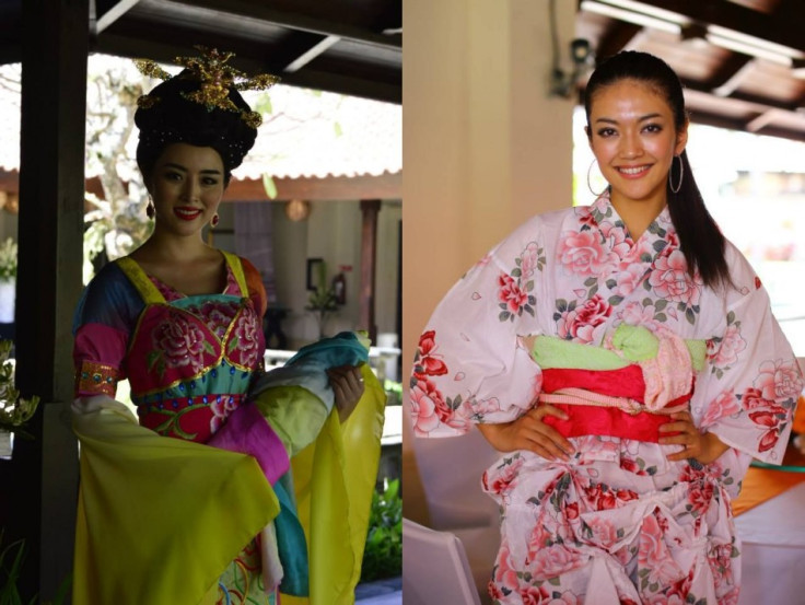 Miss China (L) and Miss Japan pose in traditional outfits for a pre-talent show in Bali, Indonesia. (Photo: Miss World/Facebook)