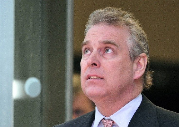 Prince Andrew was challenged at gunpoint by police in the grounds of Buckingham Palace.