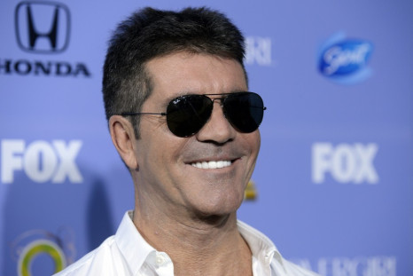 Simon Cowell has plenty to smile about after pocketing a fortune for X-Factor PIC: Reuters