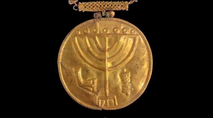A 10-cm wide gold medallion discovered in Hebrew University excavations at the foot of the Temple Mount in Jerusalem. (Photo: Ouria Tadmor/The Hebrew University of Jerusalem)