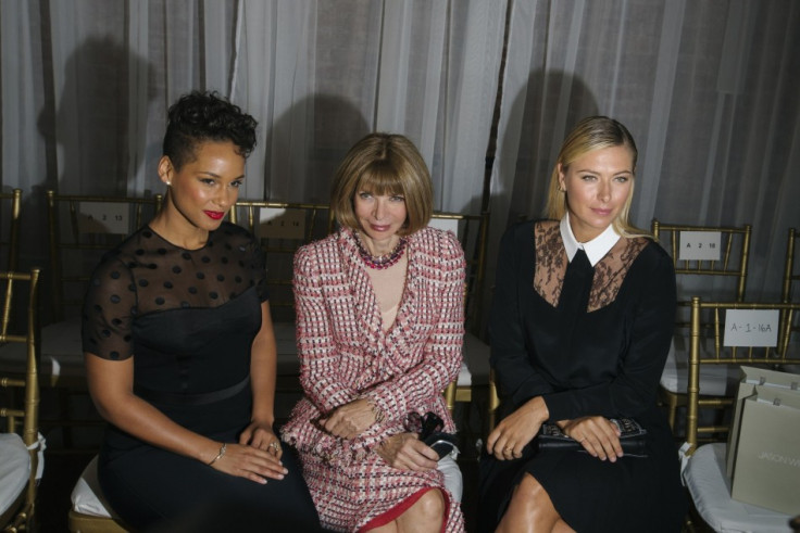 Vogue editor Anna Wintour (C) sits with tennis player Maria Sharapova (R) and singer Alicia Keys before a presentation of the Jason Wu Spring/Summer 2014 collection. (REUTERS/Lucas Jackson)