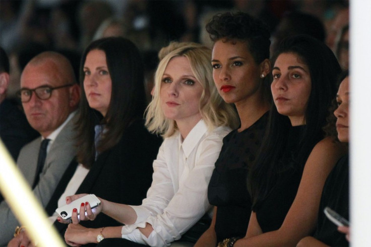 Singer Alicia Keys (2nd R) watches a presentation of the Jason Wu Spring/Summer 2014 collection during New York Fashion Week September 6, 2013. (REUTERS/Lucas Jackson)