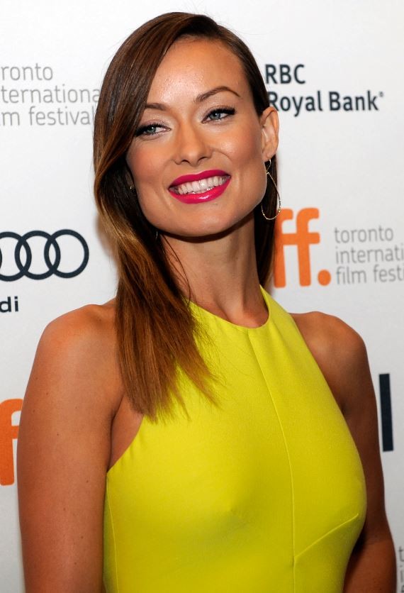 Olivia Wilde poses on the red carpet before the screening of Third Person during the 38th Toronto International Film Festival in Toronto September 9, 2013.