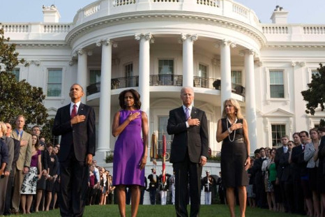 The Obamas and Bidens, along with White House staff, pay respect to 9/11 victims (Reuters)