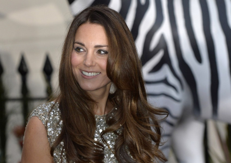 Catherine, the Duchess of Cambridge, arrives at the Tusk Conservation Awards at The Royal Society in London, September 12, 2013. This was Kate's first official appearance since the birth of Prince George. (REUTERS/Toby Melville)