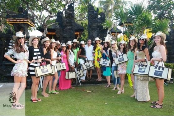Miss World contestants parade before releasing baby turtles into the wild.