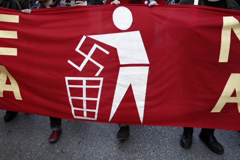 Banner held by ant-Nazi protesters at a rally in athens in February.