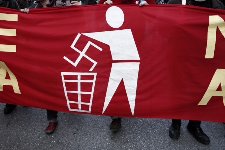 Banner held by ant-Nazi protesters at a rally in athens in February. Banner held by ant-Nazi protesters at a rally in athens in February.