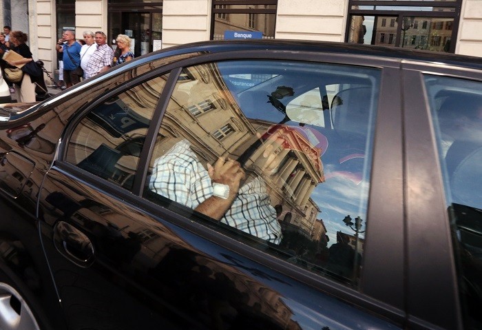 Stephan Turk, 67, who shot a fleeing robber dead at his jewellery store on Wednesday, was indicted on Friday for murder and placed under house arrest.