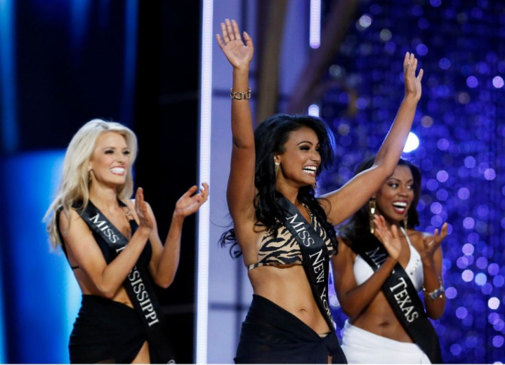 Nina Davuluri reacts as she is chosen to move on while competing in the Miss America Pageant. (REUTERS/Lucas Jackson)