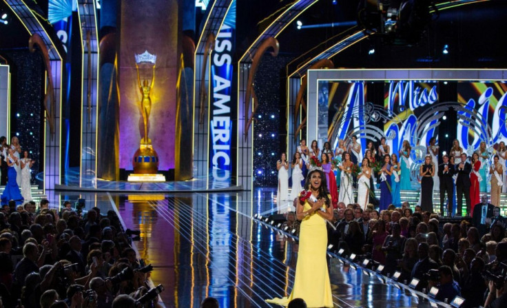 And here comes the final walking moment of Miss America 2014, Nina Davuluri posing for the shutterbugs at the end of the pageant. (REUTERS/Lucas Jackson)