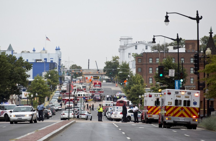 Police block off the M Street, SE, as they respond to a shooting at the Washington Navy Yard