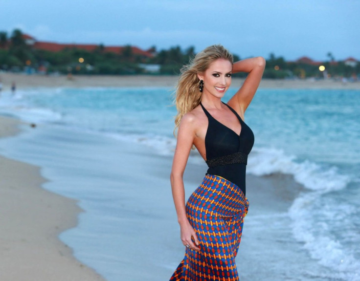 Miss World Brazil 2013, Sancler Frantz, poses on the beach during the final round of Beach Fashion contest of Miss World 2013 pageant in Bali, Indonesia. (Photo: Miss World Organisation)