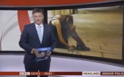Simon McCoy decided to carry on with the report still holding onto the paper Simon McCoy decided to carry on with the report still holding onto the paper