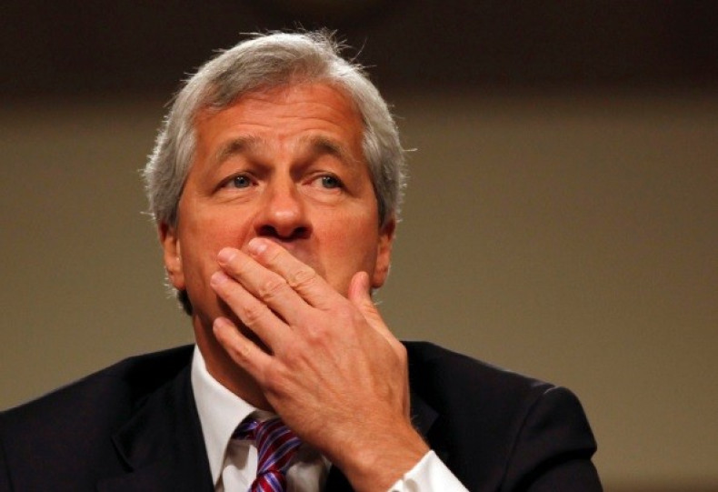 JPM led by Jamie Dimon (pictured) will have to pay $300m back to customers over debt collection procedures, which comes at the same time of the London Whale scandal $920m fine (Photo: Reuters)
