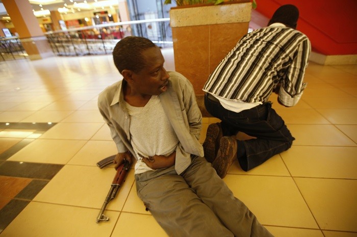 Wounded policeman and colleague, Westgate shopping mall, Nairobi