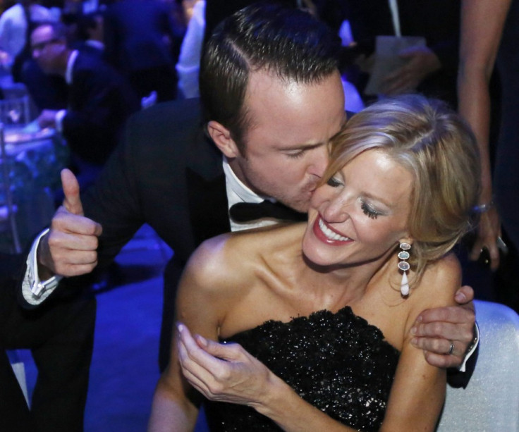 Actors Anna Gunn and Aaron Paul celebrate the success of Breaking Bad at the Governors Ball for the 65th Primetime Emmy Awards in Los Angeles September 22, 2013. (REUTERS/Mario Anzuoni)