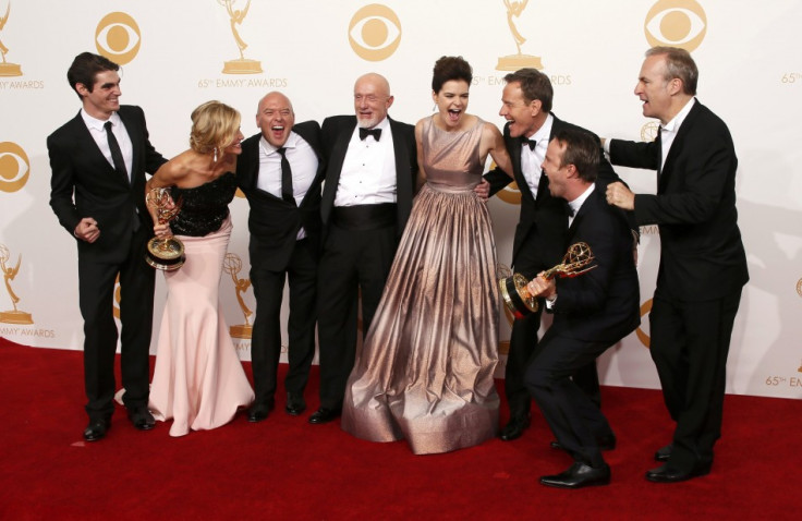 The cast from AMC's series Breaking Bad poses backstage with their awards for Outstanding Drama Series. (Reuters)