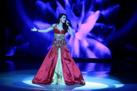 Miss Indonesia 2013, Vania Larissa, sings during the Talent Competition final at Miss World 2013 pageant in Bali. She won the talent round. (Photo: Miss World Organisation)
