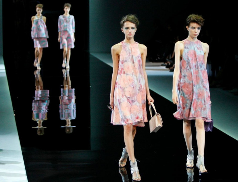 Translucent dresses in soft fabric and soft hues made Armani's spring/summer collection. (Photo: REUTERS/Alessandro Garofalo)