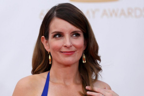 Tina Fey accidentally flashed her breast when she went to accept her Best Comedy Writing award. (Reuters)