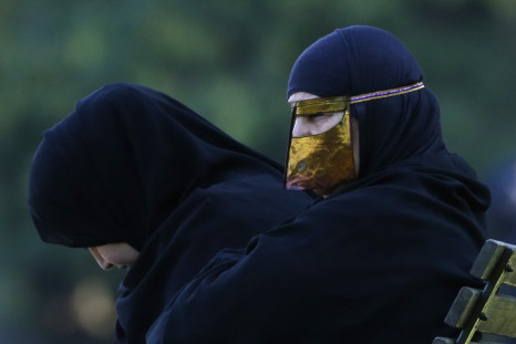Women wearing Islamic gaments in Britain as poll reveals distrust of Muslims PIC: Reuters