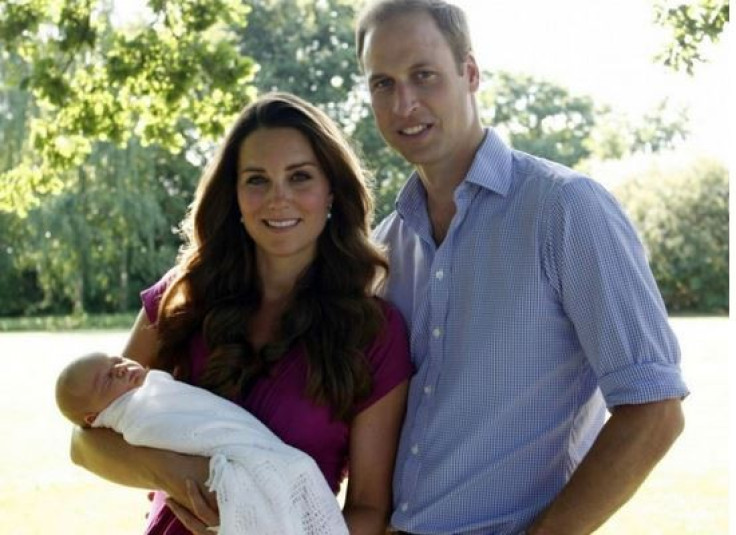 Prince William, Kate Middleton and royal baby Prince George in their first official family photograph.